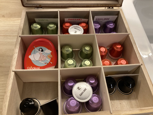 A box of different coffees carefully arranged